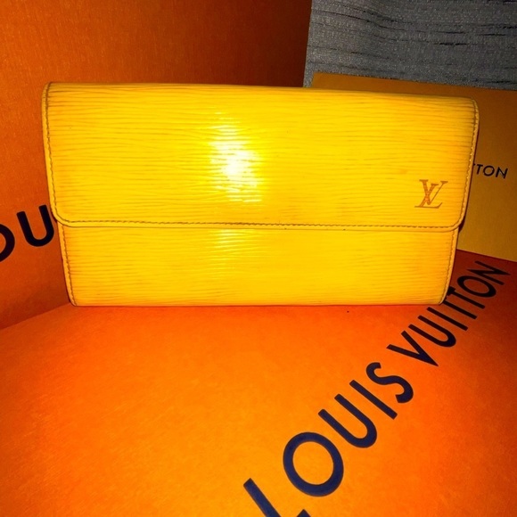 Louis Vuitton Handbags - LOUIS Vuitton Epi Sarah wallet in yellow.